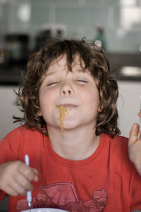 Portrait of boy eating ice cream