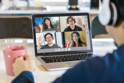 Group of people using laptop