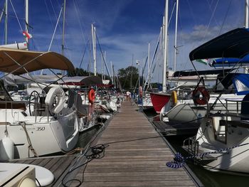 Boats moored at harbor