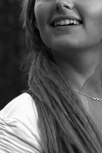 Close-up portrait of a smiling woman