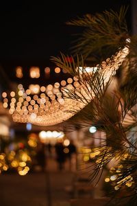 Defocused image of illuminated lights at night