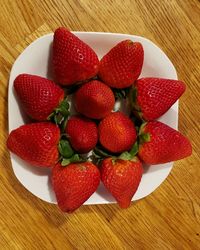 High angle view of strawberries on table