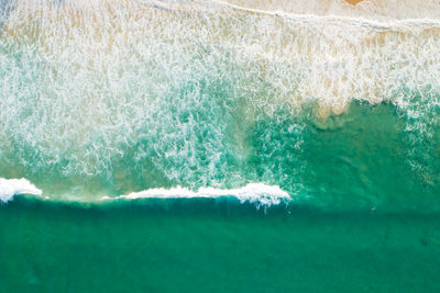 Close-up of water splashing in swimming pool