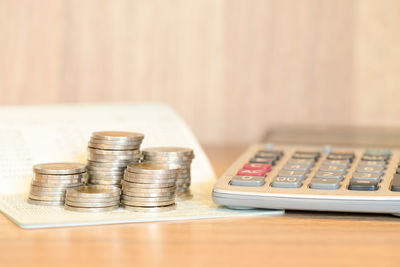 Close-up of coins on table