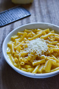 High angle view of mac and cheese on bowl on table