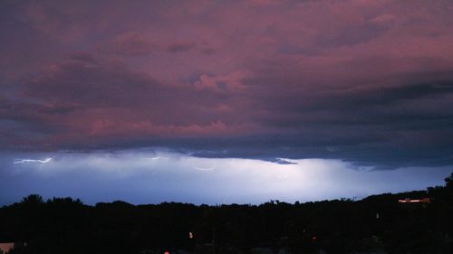 Storm clouds over cloudy sky