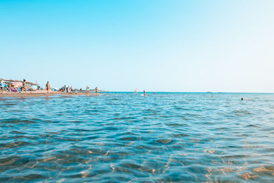 Scenic view of sea against clear sky