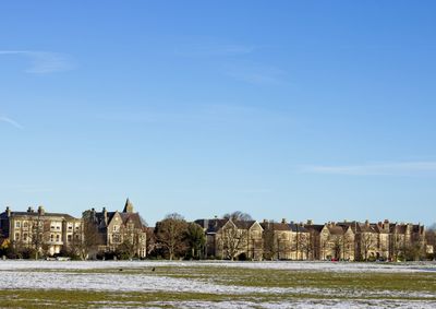 Buildings against blue sky