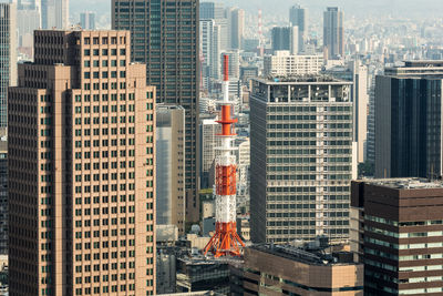 Skyscrapers in city against sky