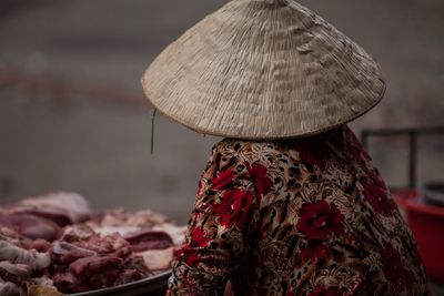 Rear view of woman wearing hat