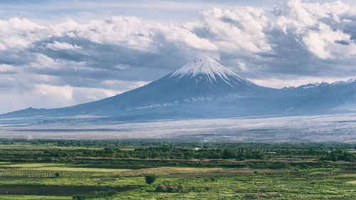 Scenic view of snowcapped mountains against sky