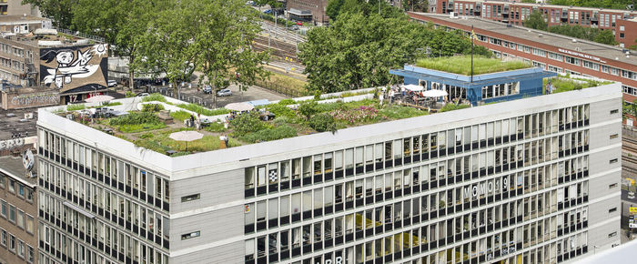 High angle view of building by street in city