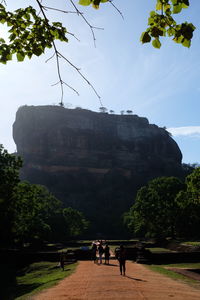 People walking on cliff