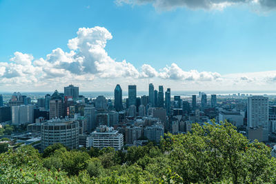 Modern buildings against sky in city