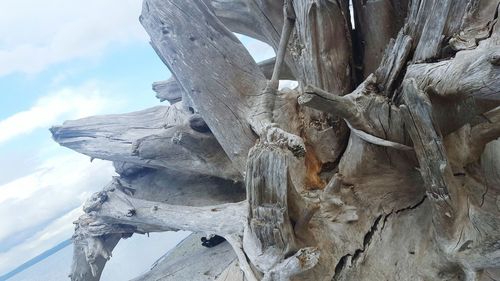 Scenic view of mountains against cloudy sky