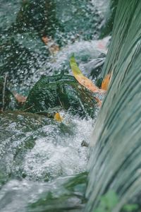 Close-up of water splashing in sea