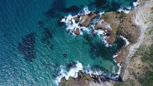 High angle view of rocks on beach