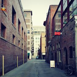 Narrow alley amidst buildings
