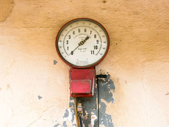 Close-up of clock on wall