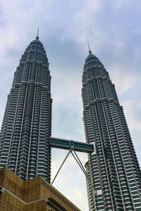 Low angle view of skyscraper against sky