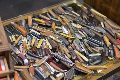 High angle view of knives on table