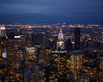 High angle view of illuminated cityscape at night