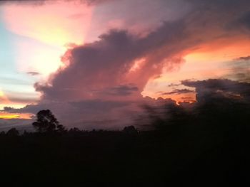 Scenic view of silhouette landscape against sky during sunset