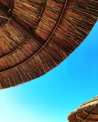 Low angle view of roof against sky