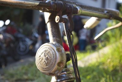 Close-up of chain hanging on metal