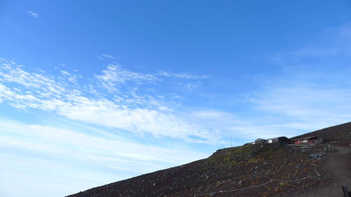 Low angle view of built structure against blue sky