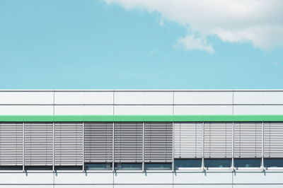 Low angle view of building against blue sky