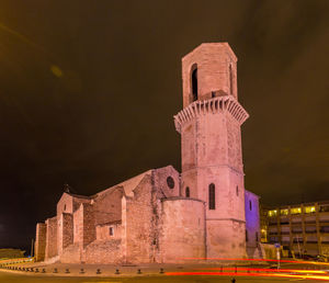 Low angle view of historical building against sky at night