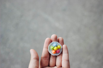 Close-up of hand holding fruit