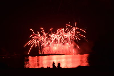 Firework display at night