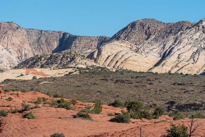 Scenic view of rocky mountains against clear sky