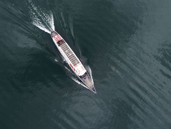 High angle view of boat sailing in sea