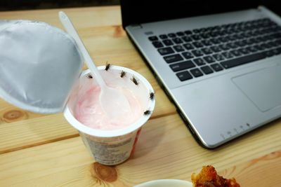 High angle view of coffee cup on table