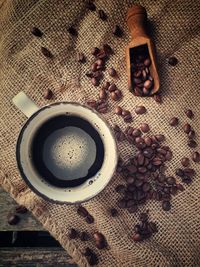 High angle view of coffee cup on table