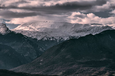 Scenic view of snowcapped mountains against sky