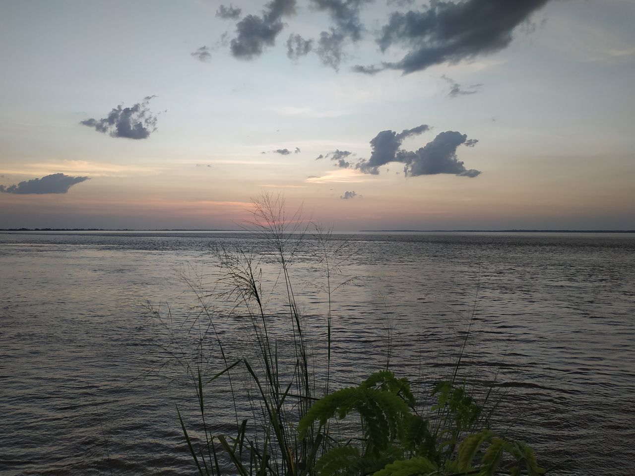 SCENIC VIEW OF SEA DURING SUNSET