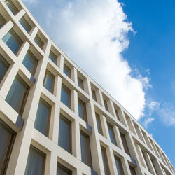 Low angle view of office building against sky