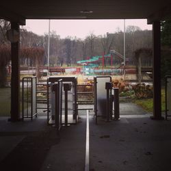 Empty built structure with trees in background