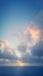 Scenic view of sea against cloudy sky