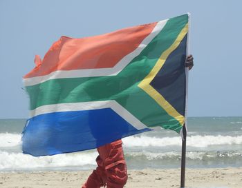 South african flaggs on ghana  beach