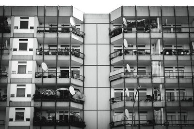 Low angle view of apartment building against sky