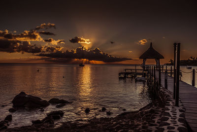 Scenic view of sea at sunset