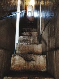 Low angle view of steps in old building