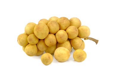 Close-up of fruits against white background