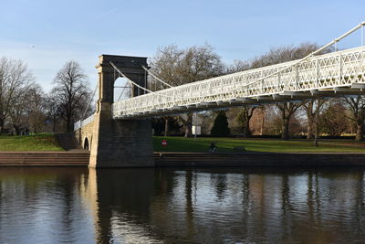 Bridge over river against sky