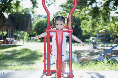 Portrait of boy playing in playground